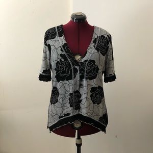 Black-and-white with a cute abdomen peek